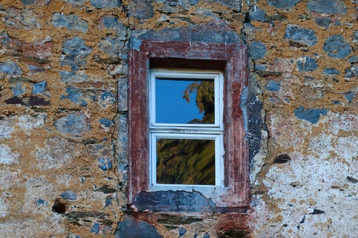 Poser un film de vitre teintée dans sa maison