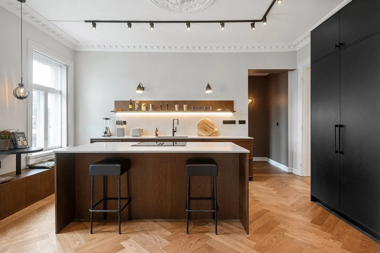 Optimiser son espace de vie : les secrets pour réussir sa cuisine ouverte sur salon.